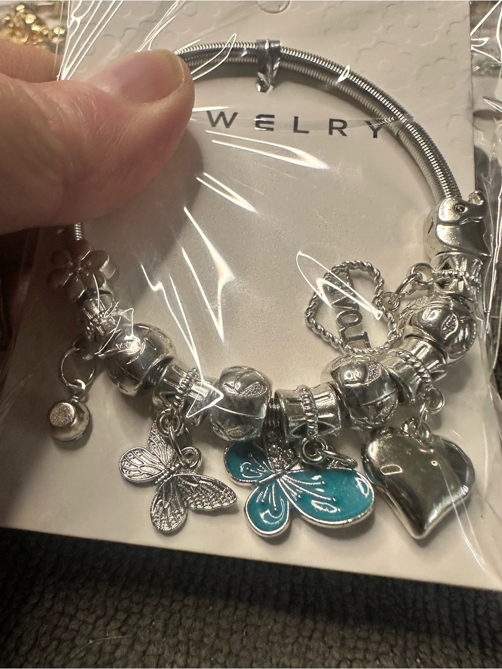 Butterfly Dsigns Silver Charm Bracelet with Teal Butterfly and Heart